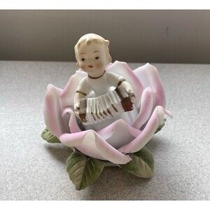 Lefton Vintage Porcelain Girl In A Flower Playing A Flute And Accordion  1699